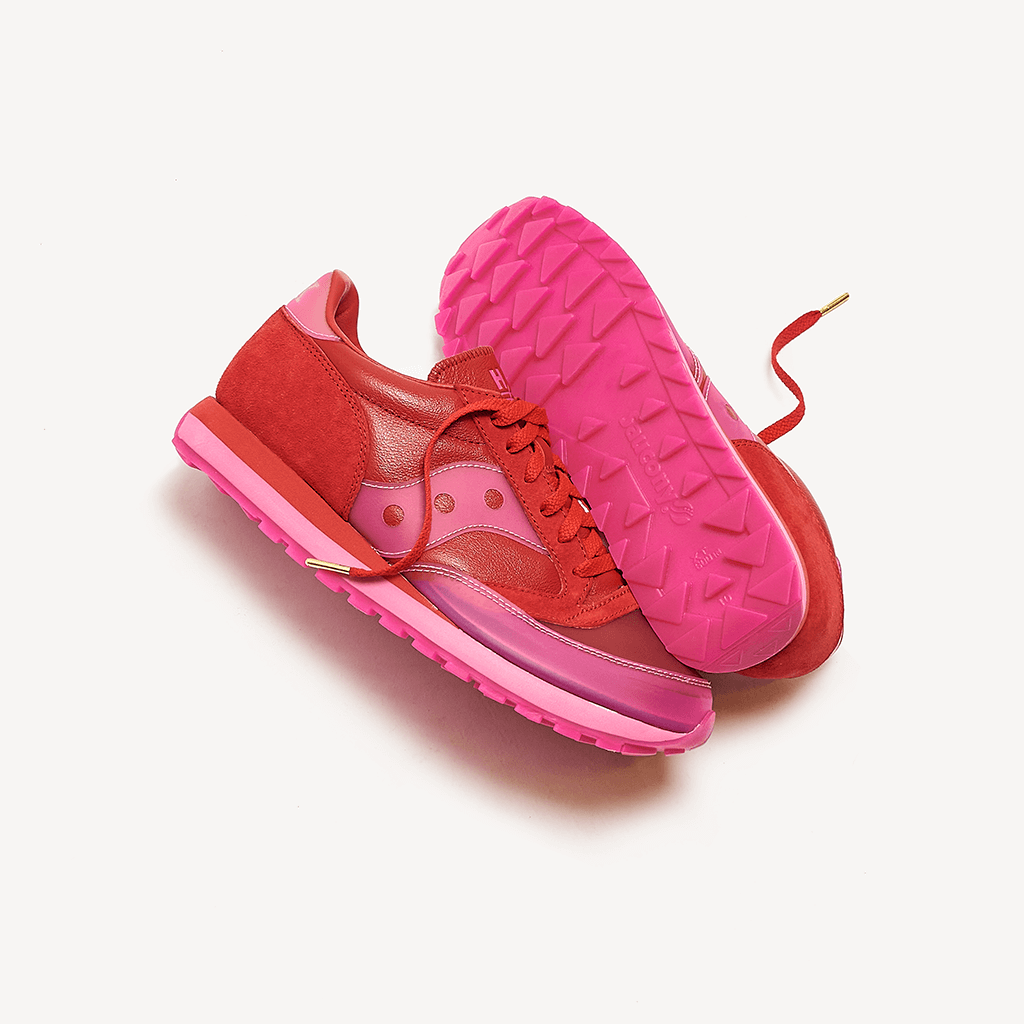 A pair of hibiscus colored sneakers